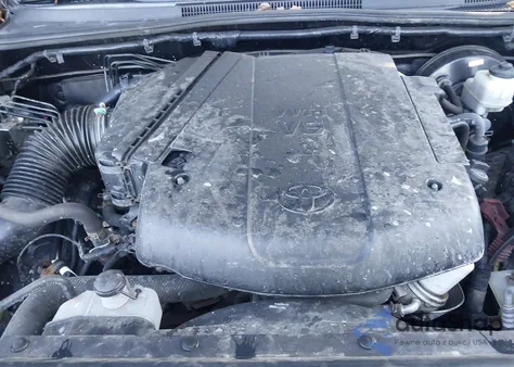 2015 Toyota Tacoma Base V6 z USA, uszkodzony, nr VIN 3TMLU4EN7FM174067